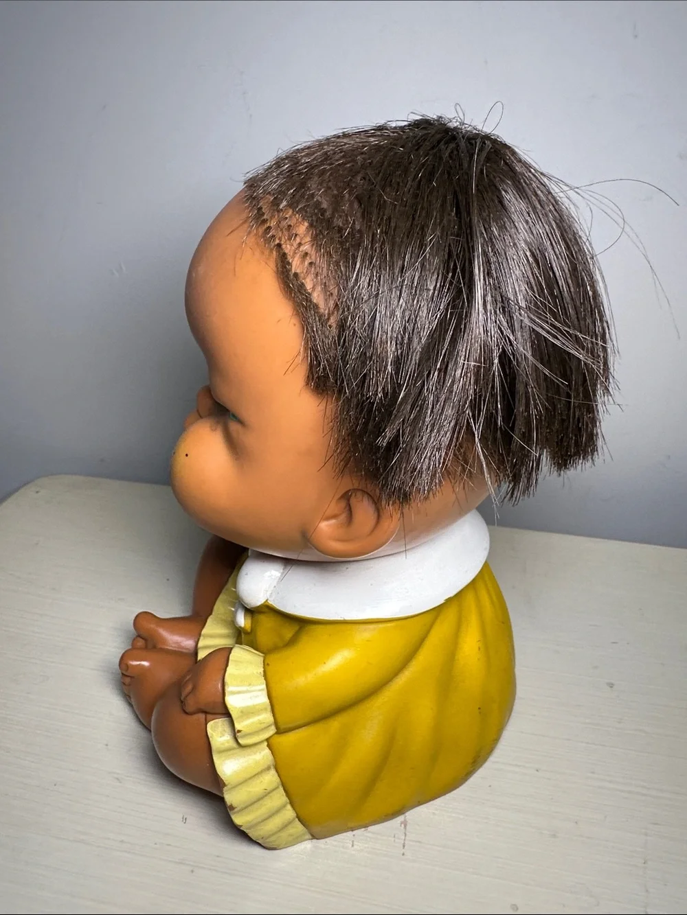 Vintage Moody Cutie grumpy Yellow Baby Doll Figure with Brown Hair Made in Japan